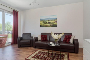 Comfy Apartment with Parking & Balcony by Noclegi Renters